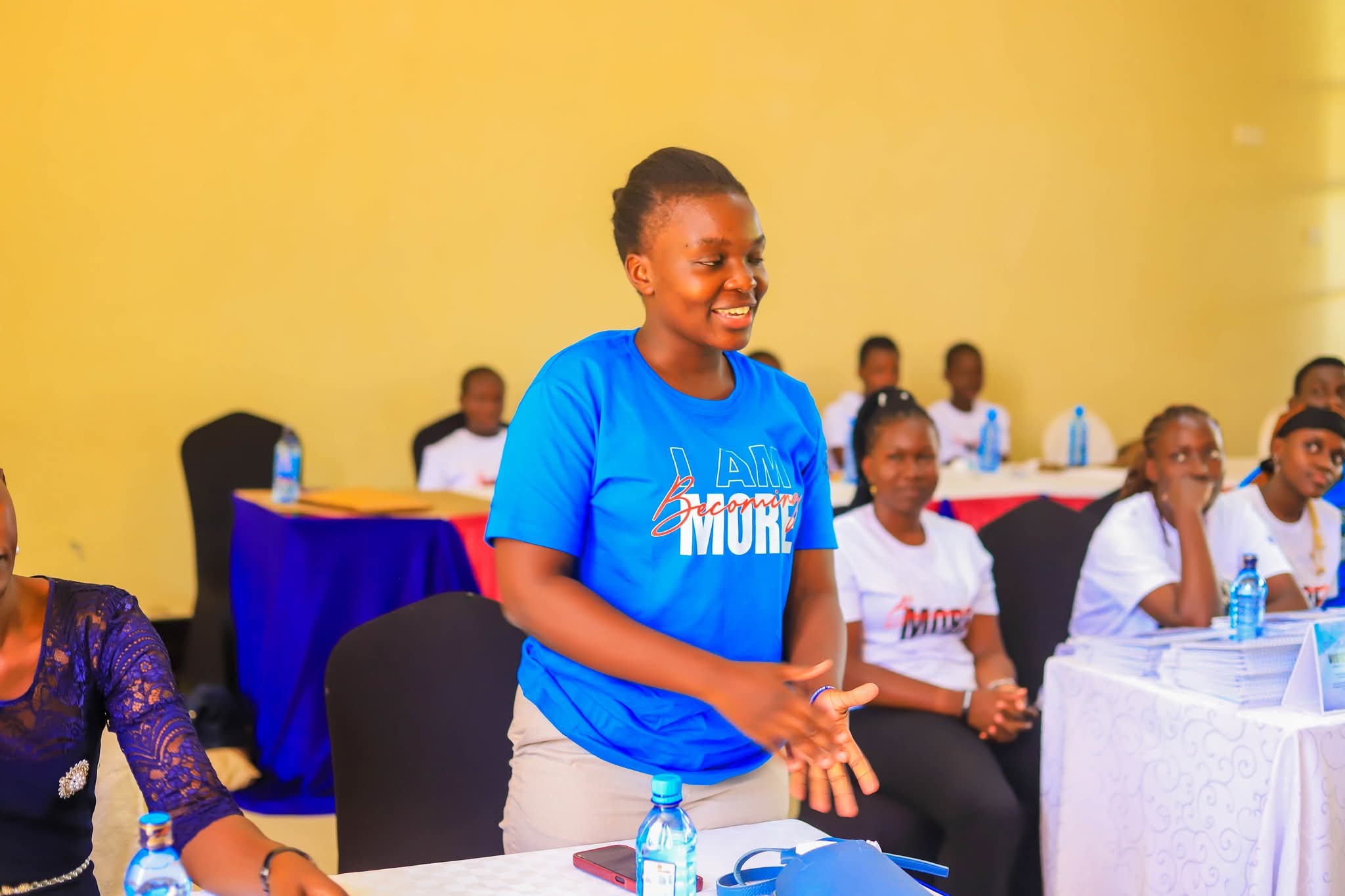 Kateleen, Kenneth's first-born daughter makes a comment during the official book launch event held in Kisumu City venue today