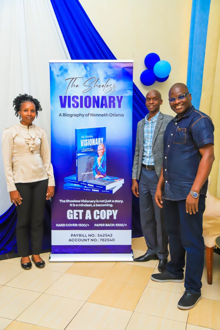 Jacob Ouko joined by his spouse, poses for a photo with Kenneth during the official launch event held in Kisumu City venue
